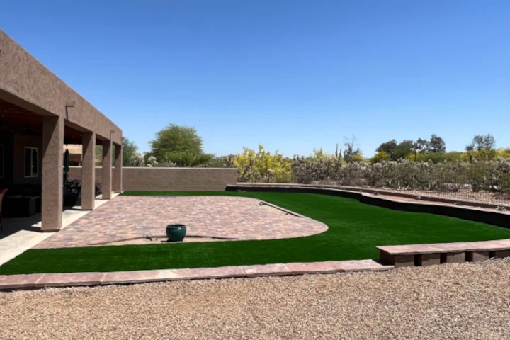 Rounded artificial grass patio installation by Luis Landscapes in Tucson AZ