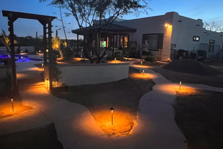 Decorative pathway lights installed along Tucson walkway by Luis Landscapes