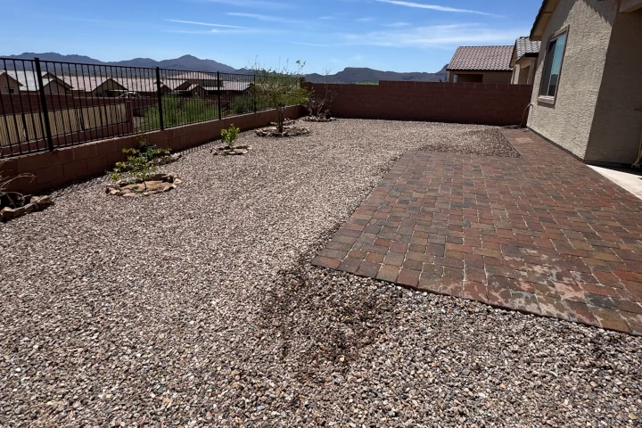 Decorative rock and gravel backyard landscaping by Luis Landscapes Tucson AZ